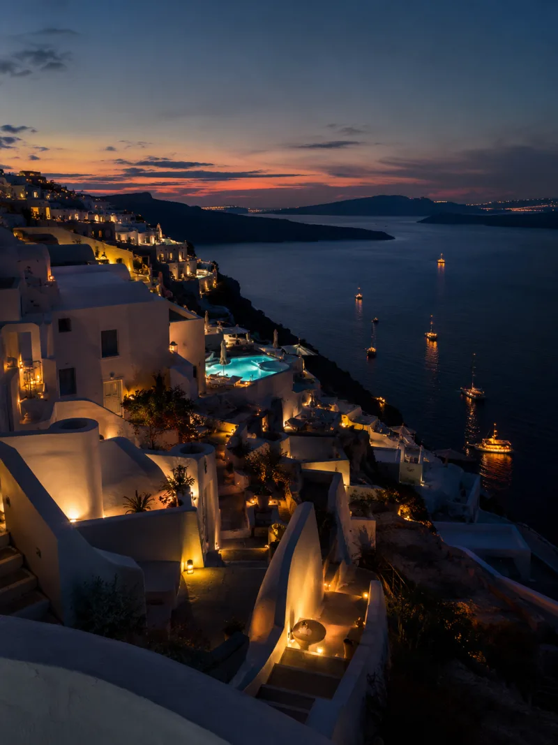 Greece — Santorini caldera view at dusk, whitewashed Cycladic architecture and the Aegean Sea
