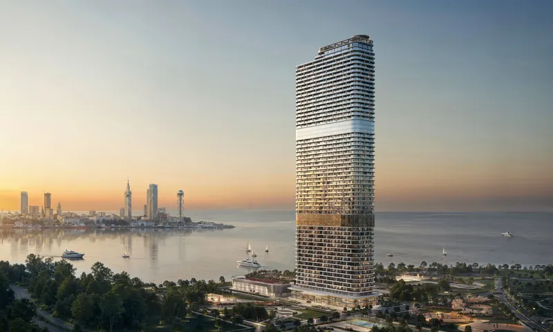 A tower on the island at dusk, Batumi behind — Ambassadori Island, Batumi