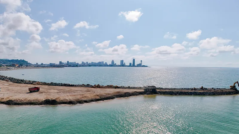 Breakwater and reclaimed land toward the city — Tonino Lamborghini Tower, Batumi