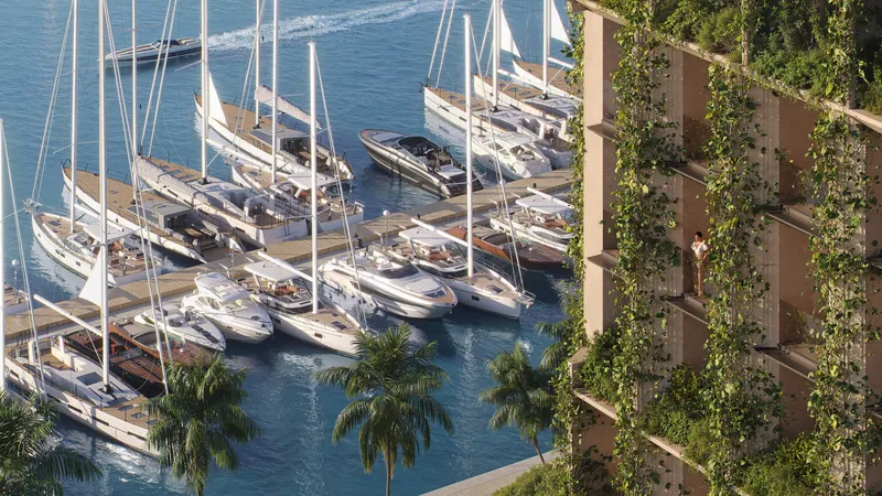 Yacht berths beside the planted facade — Silk Towers, Batumi