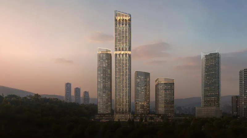 The towers at dusk above the city — Trump Tower, Tbilisi