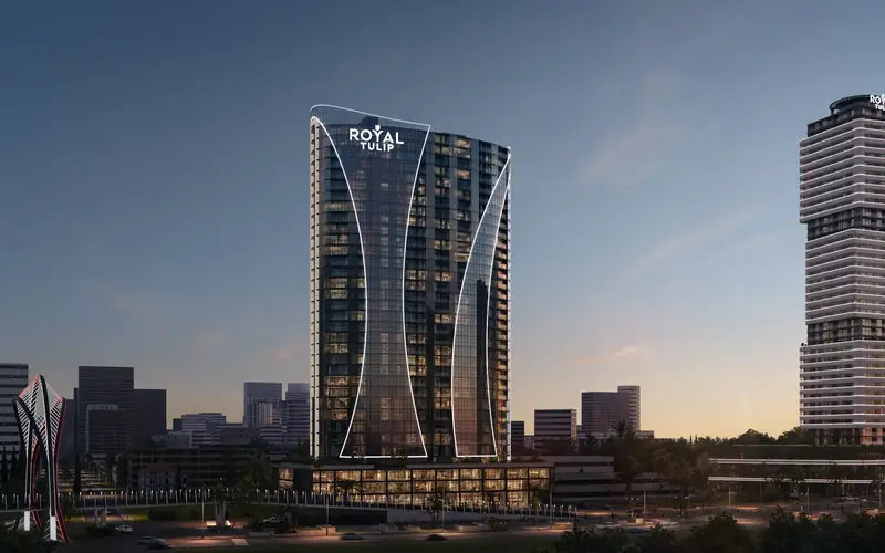 The curved glass tower at sunset — Ovale Metropol, Batumi