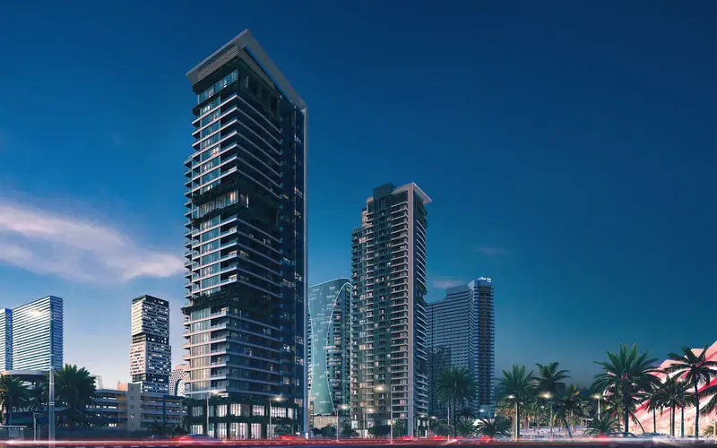 The towers at dusk above the palm boulevard — Parallel Tower, Batumi