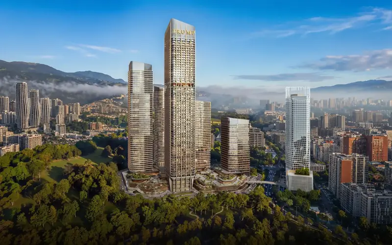The tower and neighbouring buildings above a park — Trump Tower, Tbilisi
